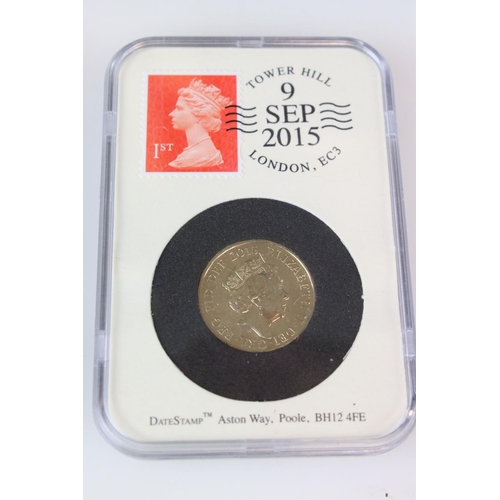 61 - A collection of date stamped slab mounted coins to include a cased 2016 £2 coin, a cased 2019 50p co... 