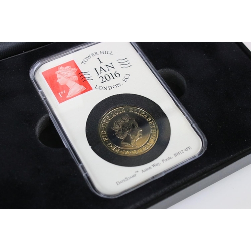 61 - A collection of date stamped slab mounted coins to include a cased 2016 £2 coin, a cased 2019 50p co... 