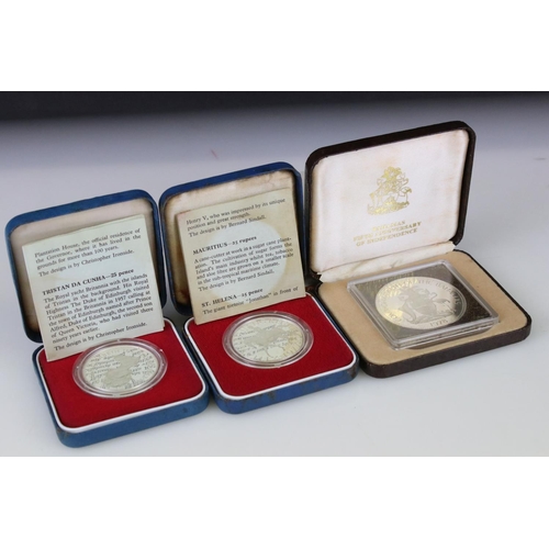 64 - A collection of three cased silver proof coins with COA's to include a Royal Mint 1977 silver proof ... 