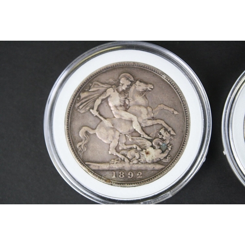 214 - Two British Queen Victoria silver full crown coins to include an 1892 and a 1899 example.