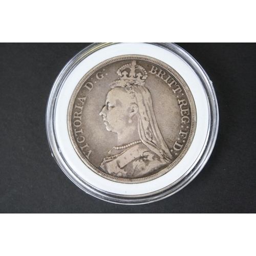 214 - Two British Queen Victoria silver full crown coins to include an 1892 and a 1899 example.