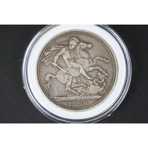 214 - Two British Queen Victoria silver full crown coins to include an 1892 and a 1899 example.