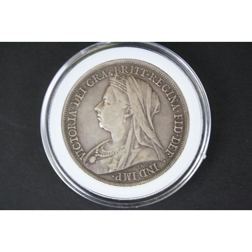 214 - Two British Queen Victoria silver full crown coins to include an 1892 and a 1899 example.