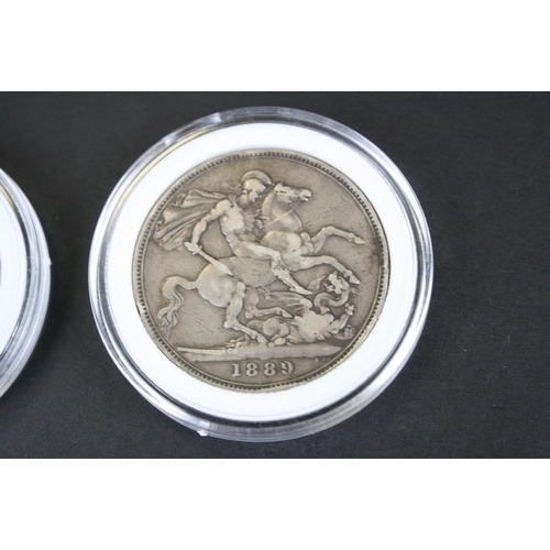 215 - Two British Queen Victoria silver full crown coins to include an 1889 and a 1895 example.