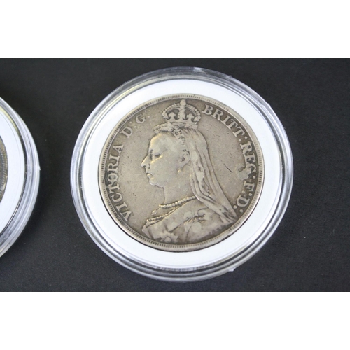 215 - Two British Queen Victoria silver full crown coins to include an 1889 and a 1895 example.