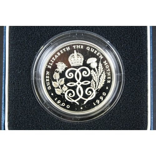 219 - A Royal Mint Queen Elizabeth II 90th Birthday silver proof crown complete with box and COA together ... 