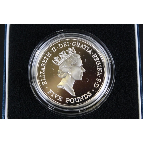 219 - A Royal Mint Queen Elizabeth II 90th Birthday silver proof crown complete with box and COA together ... 