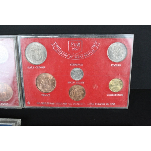 222 - A collection of mainly British Royal Mint uncirculated coin sets to include Crowns, five pound coins... 