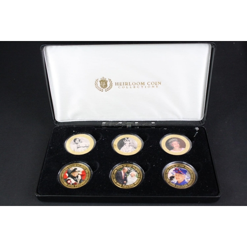 207 - A collection of three cased coins sets to include 'The Life & Times of Her Majesty the Queen' £5 coi... 