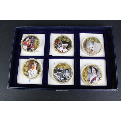 207 - A collection of three cased coins sets to include 'The Life & Times of Her Majesty the Queen' £5 coi... 