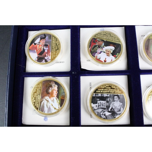 207 - A collection of three cased coins sets to include 'The Life & Times of Her Majesty the Queen' £5 coi... 