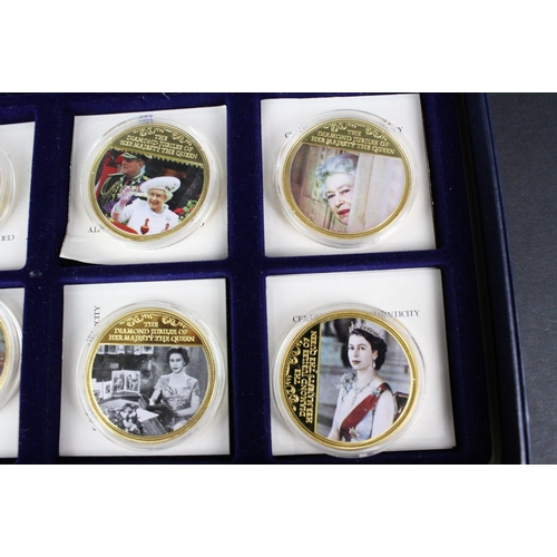 207 - A collection of three cased coins sets to include 'The Life & Times of Her Majesty the Queen' £5 coi... 