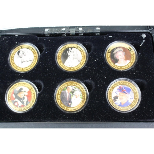 207 - A collection of three cased coins sets to include 'The Life & Times of Her Majesty the Queen' £5 coi... 