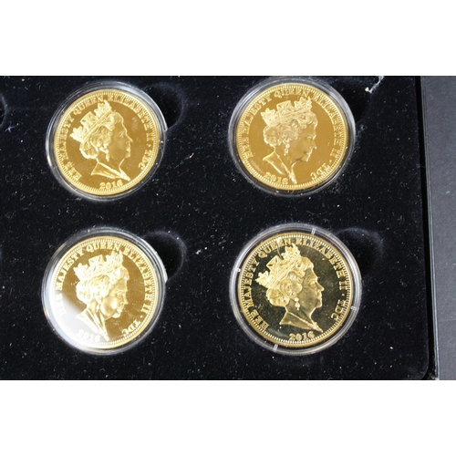 207 - A collection of three cased coins sets to include 'The Life & Times of Her Majesty the Queen' £5 coi... 