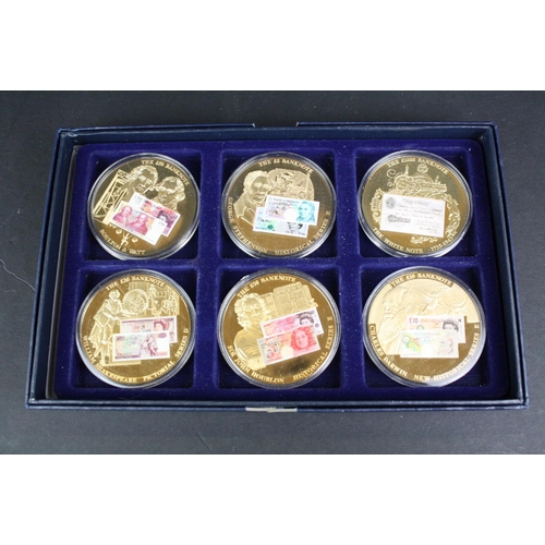 207 - A collection of three cased coins sets to include 'The Life & Times of Her Majesty the Queen' £5 coi... 