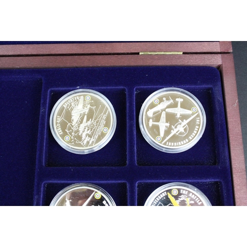 210 - A Windsor Mint 'Battle of Britain' silver plated six coin proof set together with a Windsor Mint 'Th... 