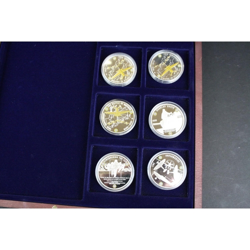 210 - A Windsor Mint 'Battle of Britain' silver plated six coin proof set together with a Windsor Mint 'Th... 