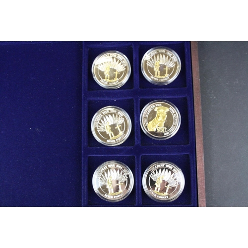 210 - A Windsor Mint 'Battle of Britain' silver plated six coin proof set together with a Windsor Mint 'Th... 