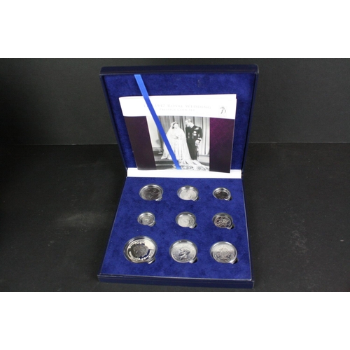 213 - A collection of mixed commemorative and collectors coin sets to include The 1947 Royal Wedding prest... 