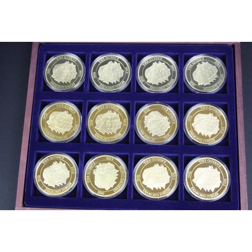 38 - The Windsor Mint The Queens Diamond Jubilee 1952-2012 gold plated twelve coins set in fitted wooden ... 