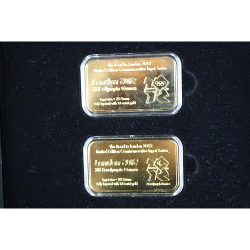 44 - A London Mint Office London 2012 Olympics coin and silver layered ingot set together with a London M... 