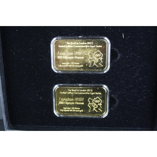 44 - A London Mint Office London 2012 Olympics coin and silver layered ingot set together with a London M... 