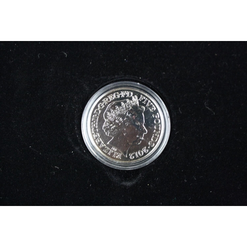 44 - A London Mint Office London 2012 Olympics coin and silver layered ingot set together with a London M... 