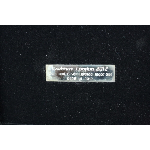 44 - A London Mint Office London 2012 Olympics coin and silver layered ingot set together with a London M... 