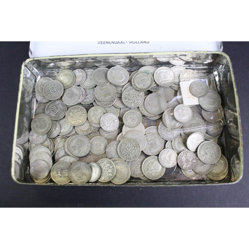 60 - A collection of British sixpence and threepence silver coins to include King George V and King Georg... 