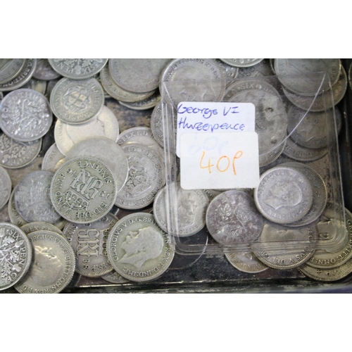 60 - A collection of British sixpence and threepence silver coins to include King George V and King Georg... 