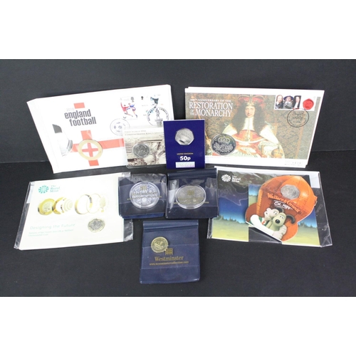 65 - A small collection of mint proof coins to include a 2017 Designing the Future £1 coin, 2019 Wallace ... 