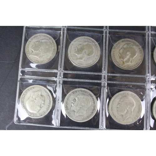 67 - A collection of thirty British King George V pre 1947 silver florin coins