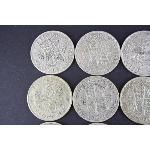 68 - A collection of twelve British King George VI pre 1947 silver half crown coins.