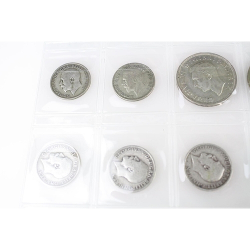 74 - A collection of British pre decimal silver coins to include King Edward VII shillings, King George V... 