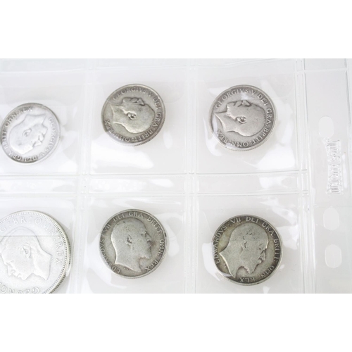 74 - A collection of British pre decimal silver coins to include King Edward VII shillings, King George V... 