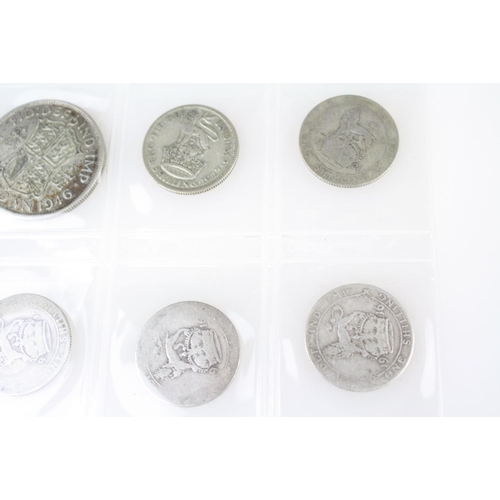 74 - A collection of British pre decimal silver coins to include King Edward VII shillings, King George V... 