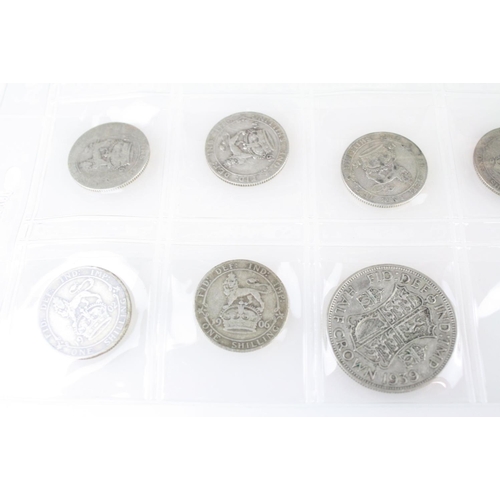 74 - A collection of British pre decimal silver coins to include King Edward VII shillings, King George V... 