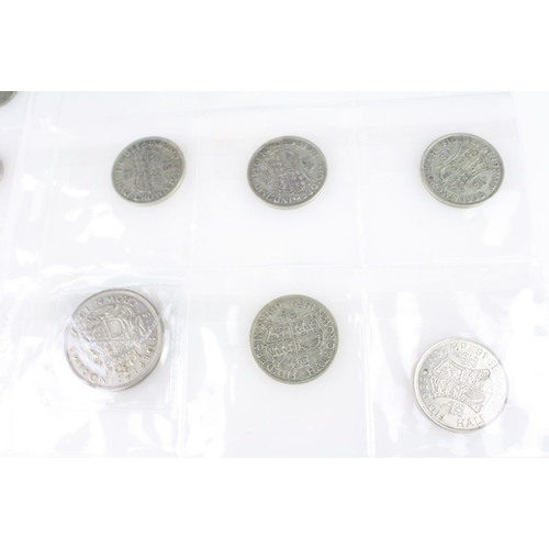 74 - A collection of British pre decimal silver coins to include King Edward VII shillings, King George V... 