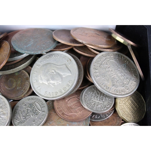 75 - A small collection of British and Foreign coins to include British pre decimal silver examples.