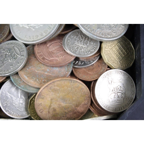 75 - A small collection of British and Foreign coins to include British pre decimal silver examples.