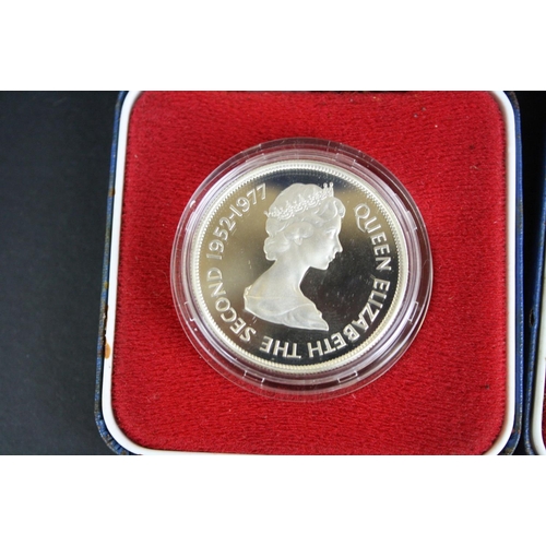 77 - A collection of three cased silver proof coins with COA's to include a Royal Mint 1977 silver proof ... 