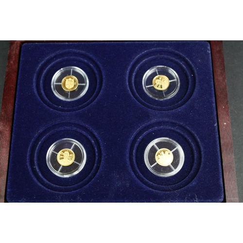 103 - A cased The Year Of The Three Kings four gold coin set, coins struck in .585 14ct gold, limited edit... 