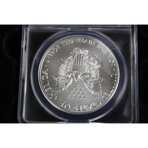 107 - A United States of America 2016 1oz silver dollar, slab mounted and in fitted presentation display b... 