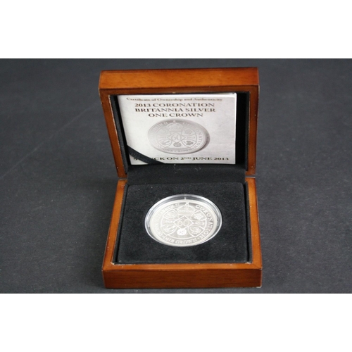 116 - A London Mint Office 2013 Coronation Britannia silver one crown coin in original display box with CO... 