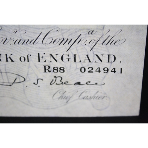 122 - A British Bank of England white Five Pound Banknote, serial No.R88 024941, Dated 27th June 1950.