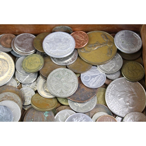 209 - A collection of mixed coins to include foreign and pre decimal British examples.