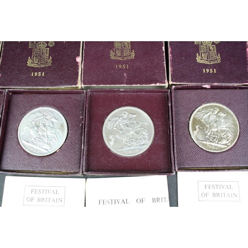 79 - A large collection of British commemorative crown coins.