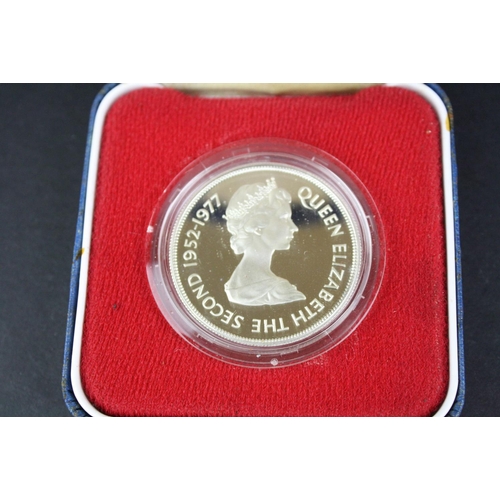 80 - A collection of three cased silver proof coins with COA's to include a Royal Mint 1977 silver proof ... 