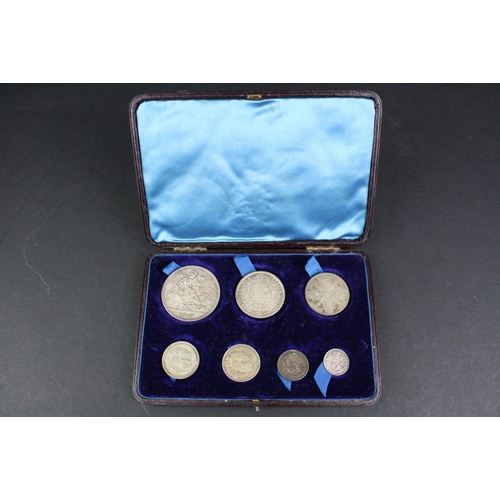 87 - A Cased Queen Victoria seven coin silver set to include full crown, half crown, florin, shilling, si... 