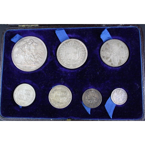 87 - A Cased Queen Victoria seven coin silver set to include full crown, half crown, florin, shilling, si... 